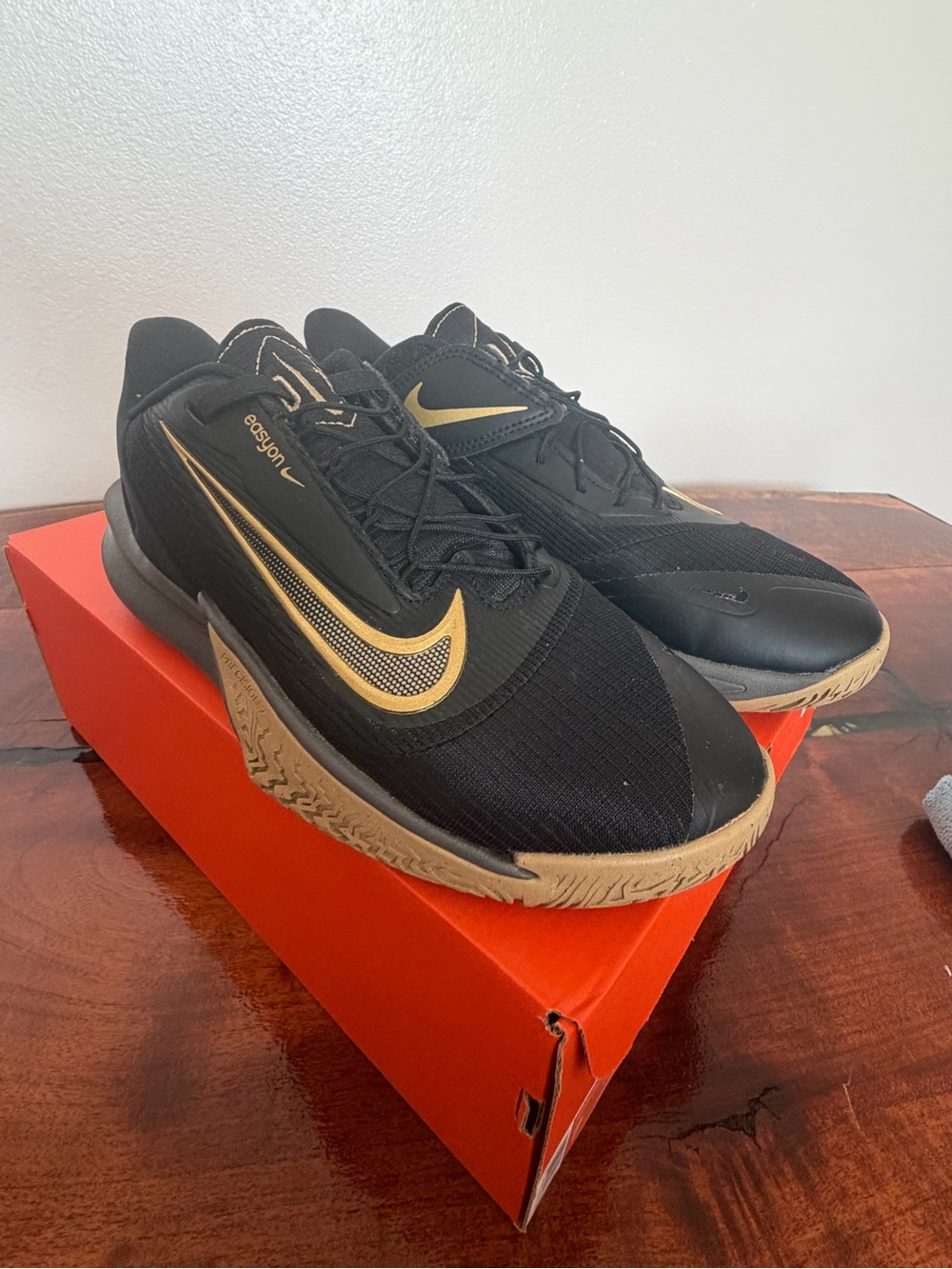 Nike Men’s Black and Gold Low-Profile Training Shoes